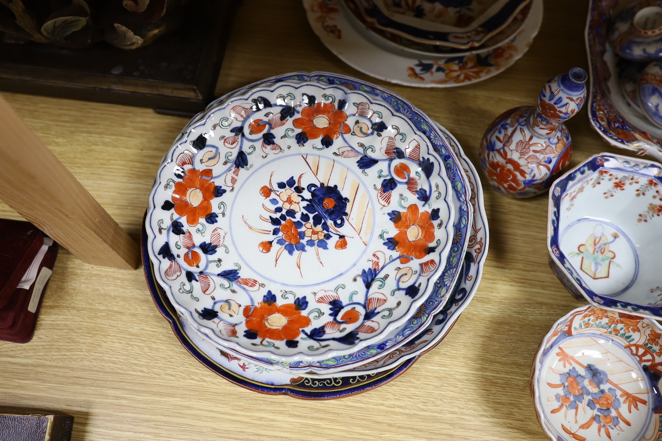 A Japanese Imari two handled vase, a Kangxi Imari bowl a/f and a collection of similar Japanese and continental ceramics
